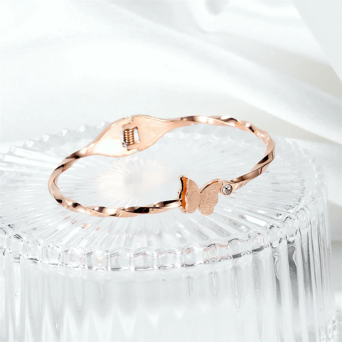 Clear Cubic Zirconia & 18K Rose Gold-Plated Frosted Butterfly Twisted Bangle