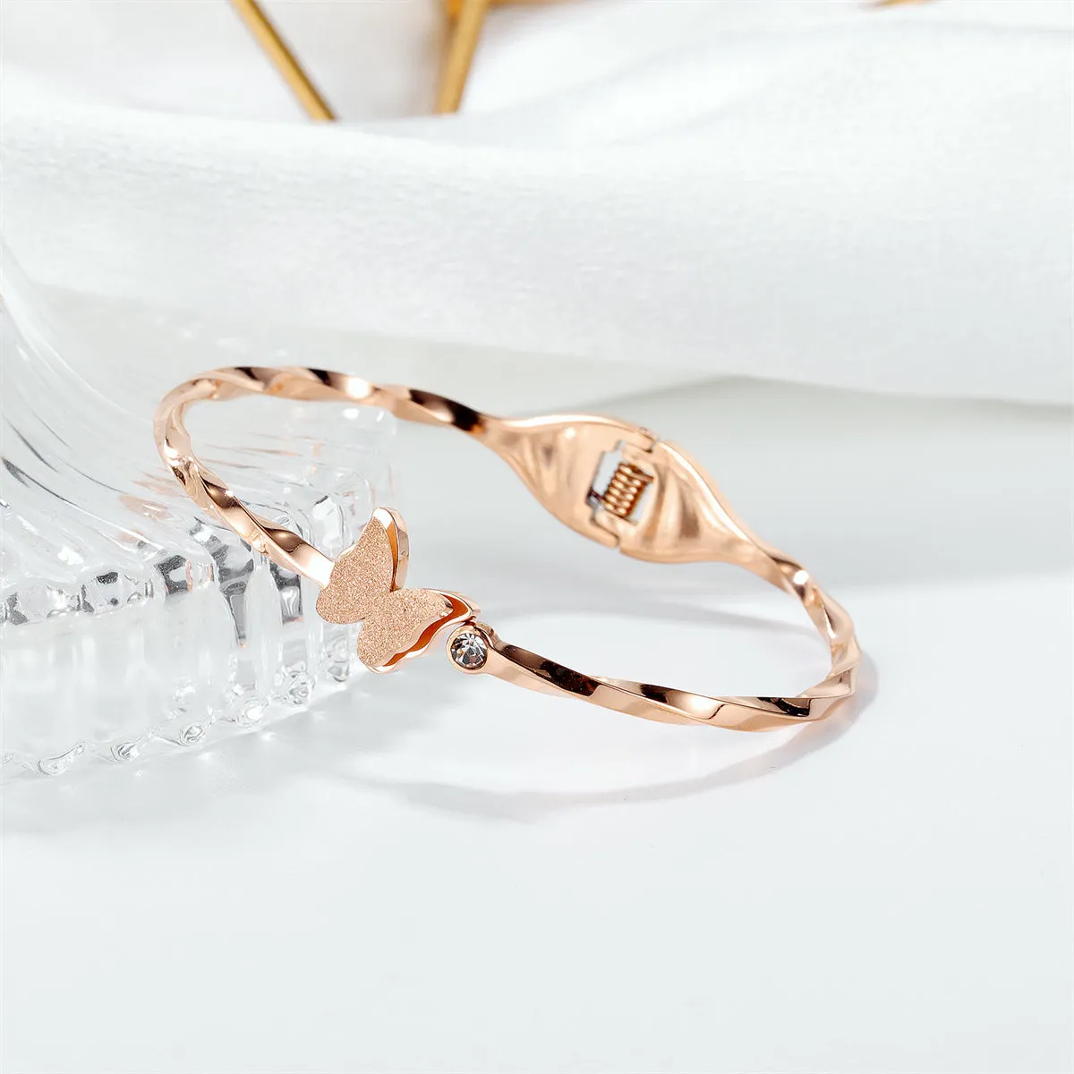 Clear Cubic Zirconia & 18K Rose Gold-Plated Frosted Butterfly Twisted Bangle