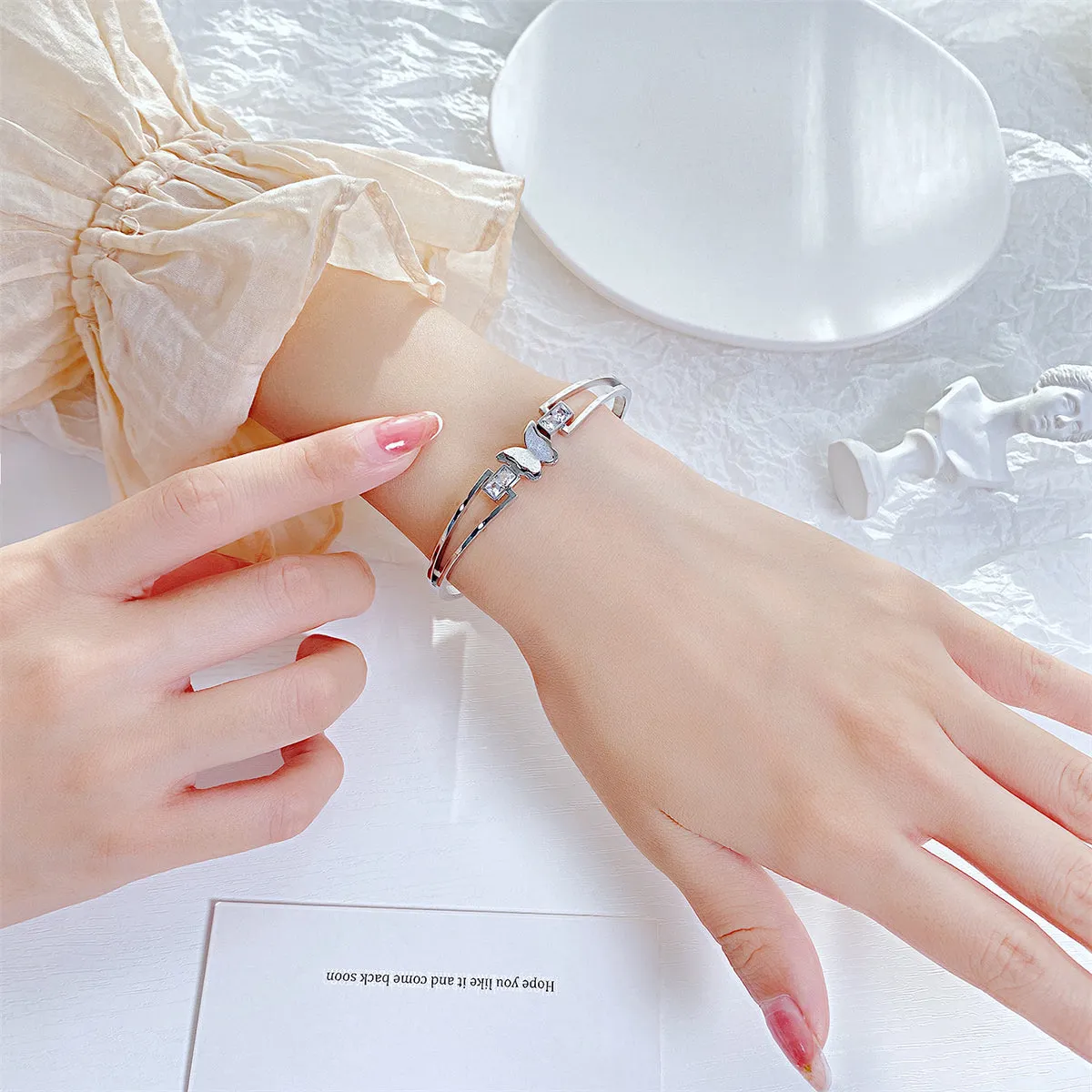 Cubic Zirconia & Silver-Plated Frosted Butterfly Layered Band Bangle