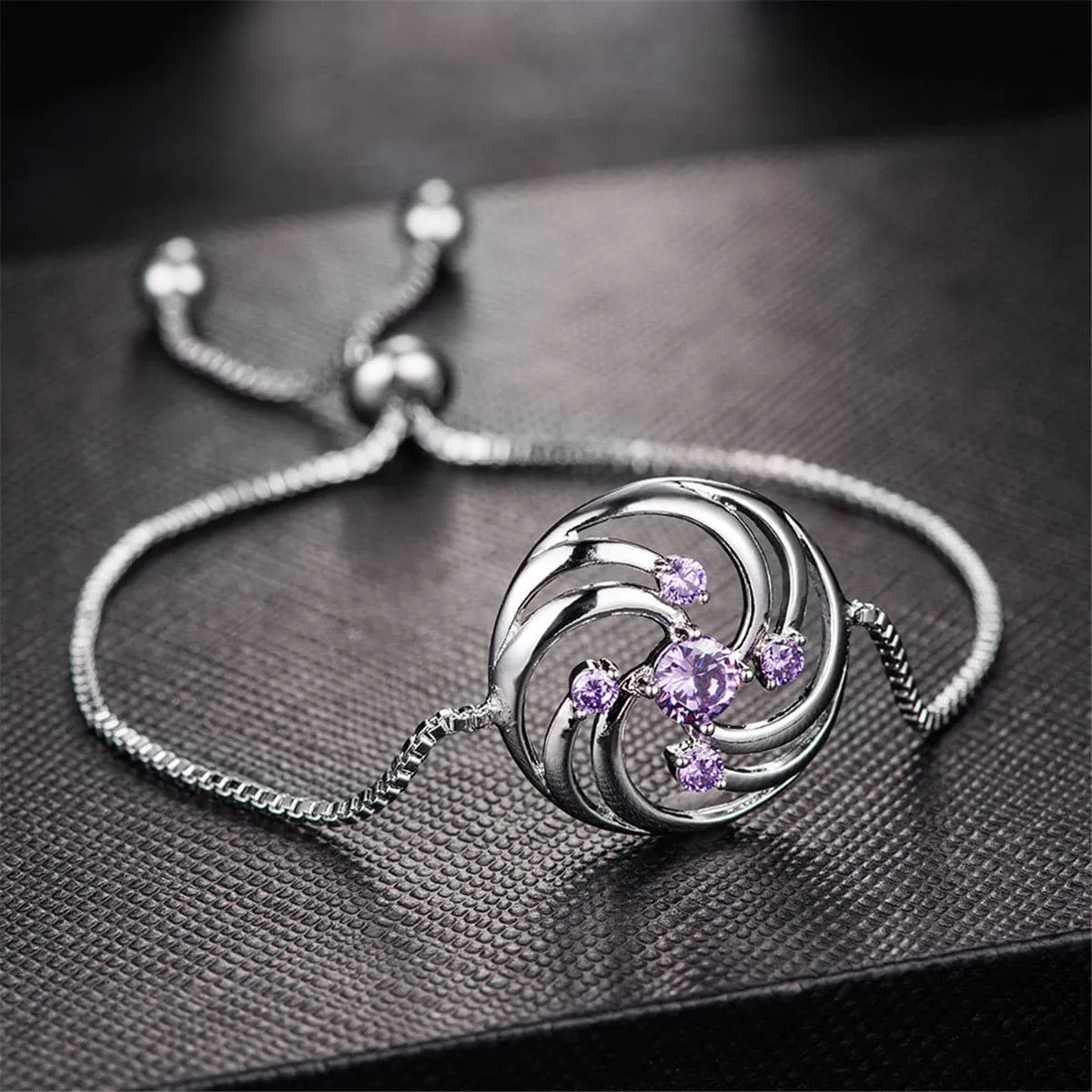 Cubic Zirconia & Silver-Plated Vortex Charm Bracelet