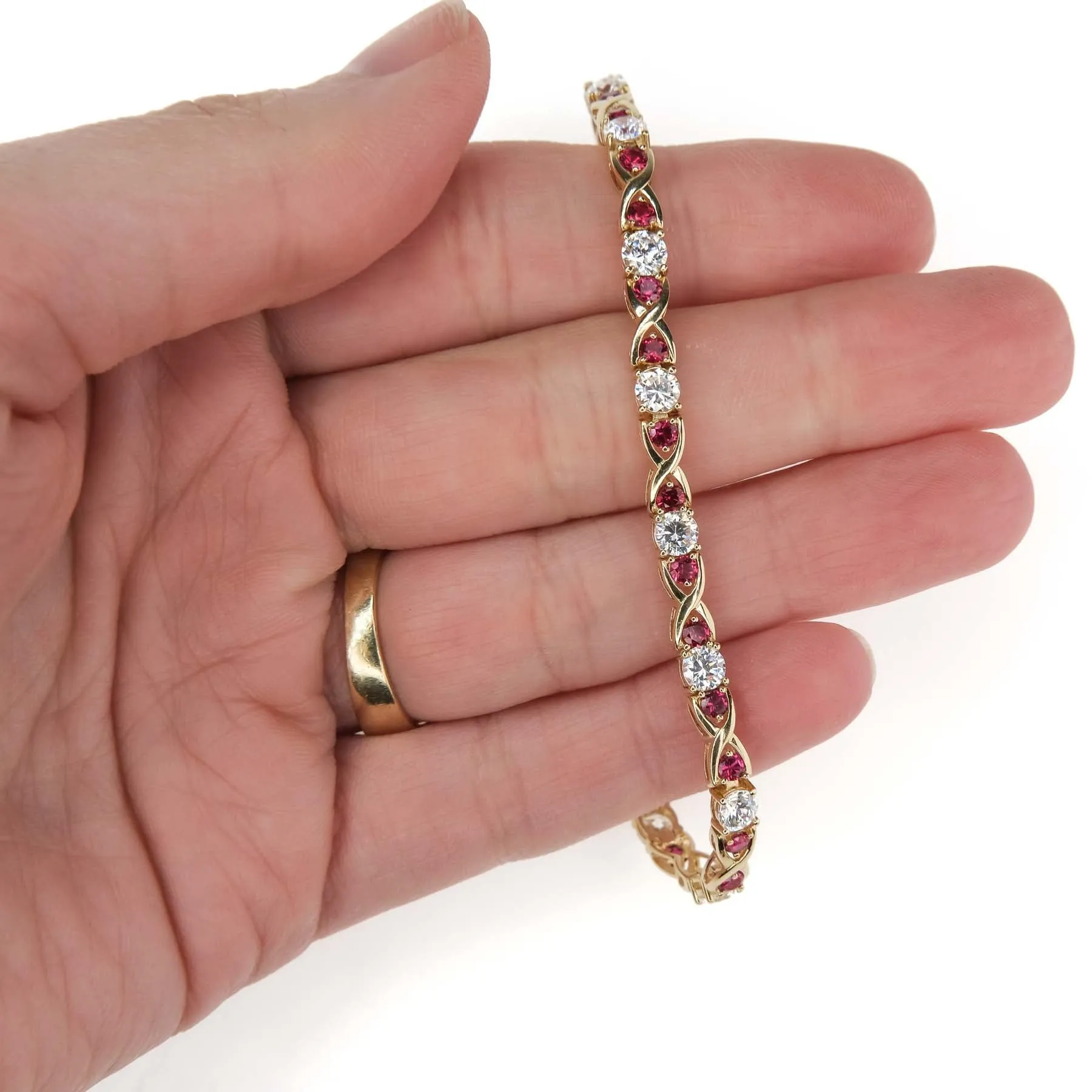 Cubic Zirconia and Red Spinel "X"Link Tennis Bracelet is 14K Yellow Gold