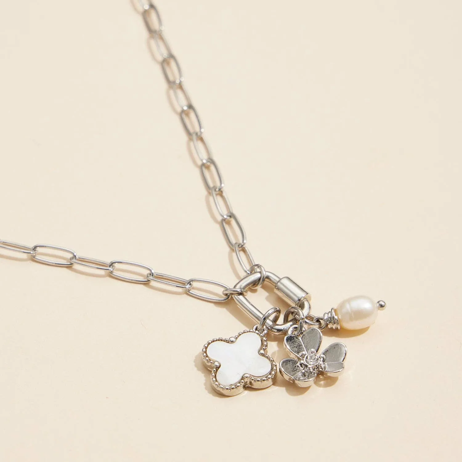 Gold Dipped Necklace with Charms and Pearl Accent