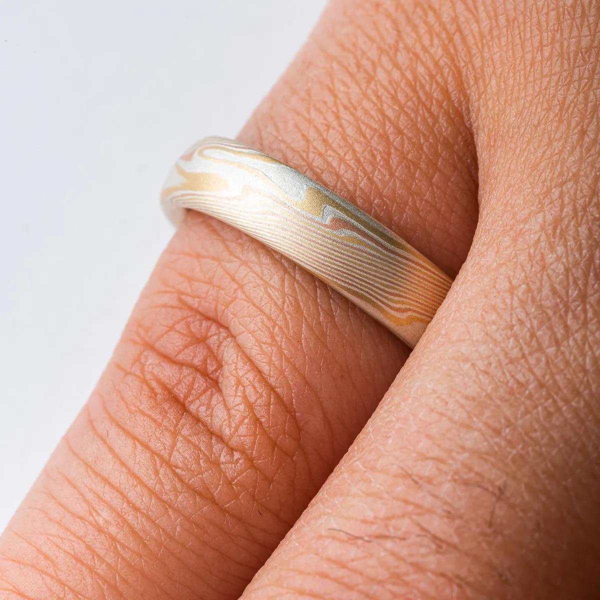 Mokume Gane Delicate Wedding Band or Ring in Twist Pattern and Fire Palette