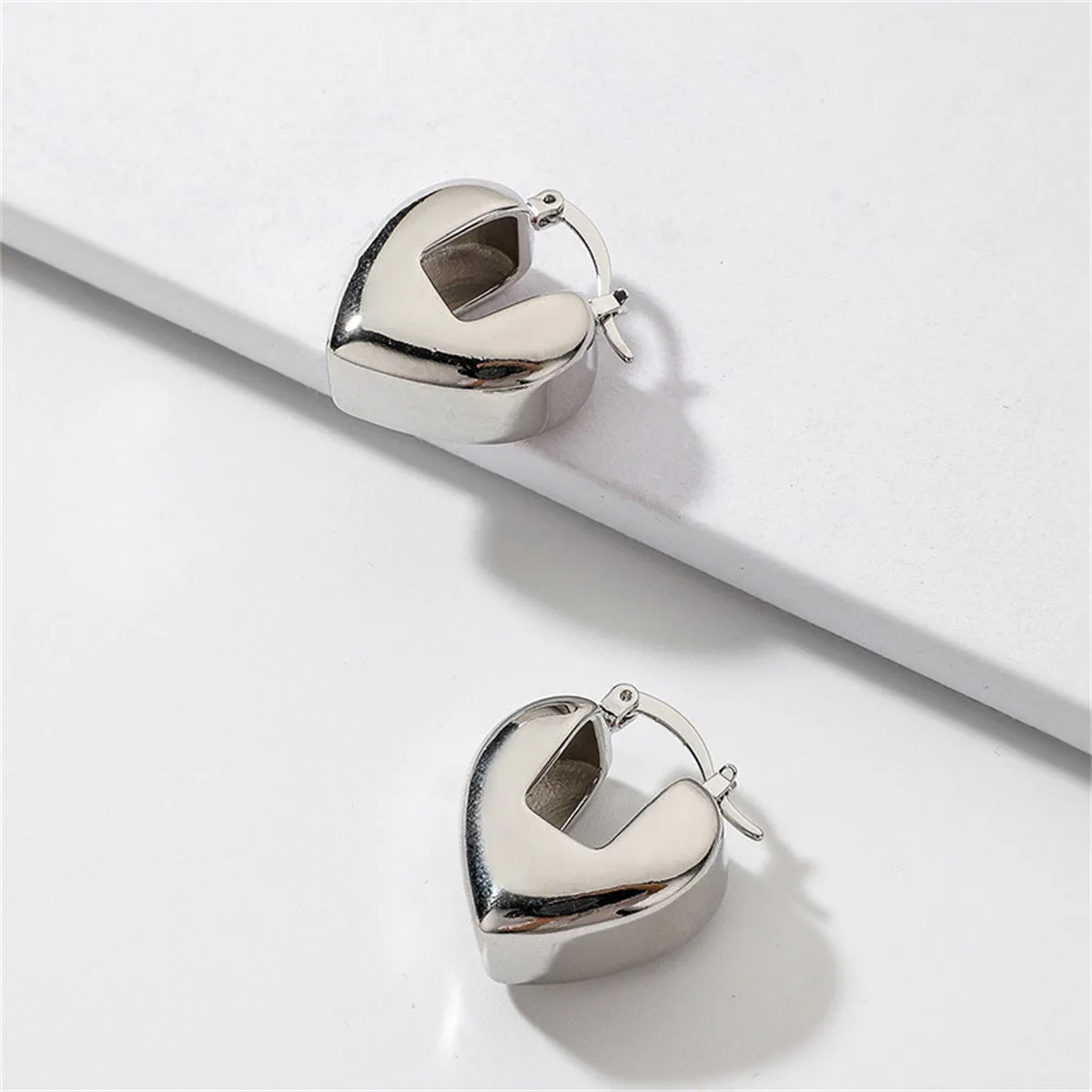 Silver-Plated Heart Huggie Earrings