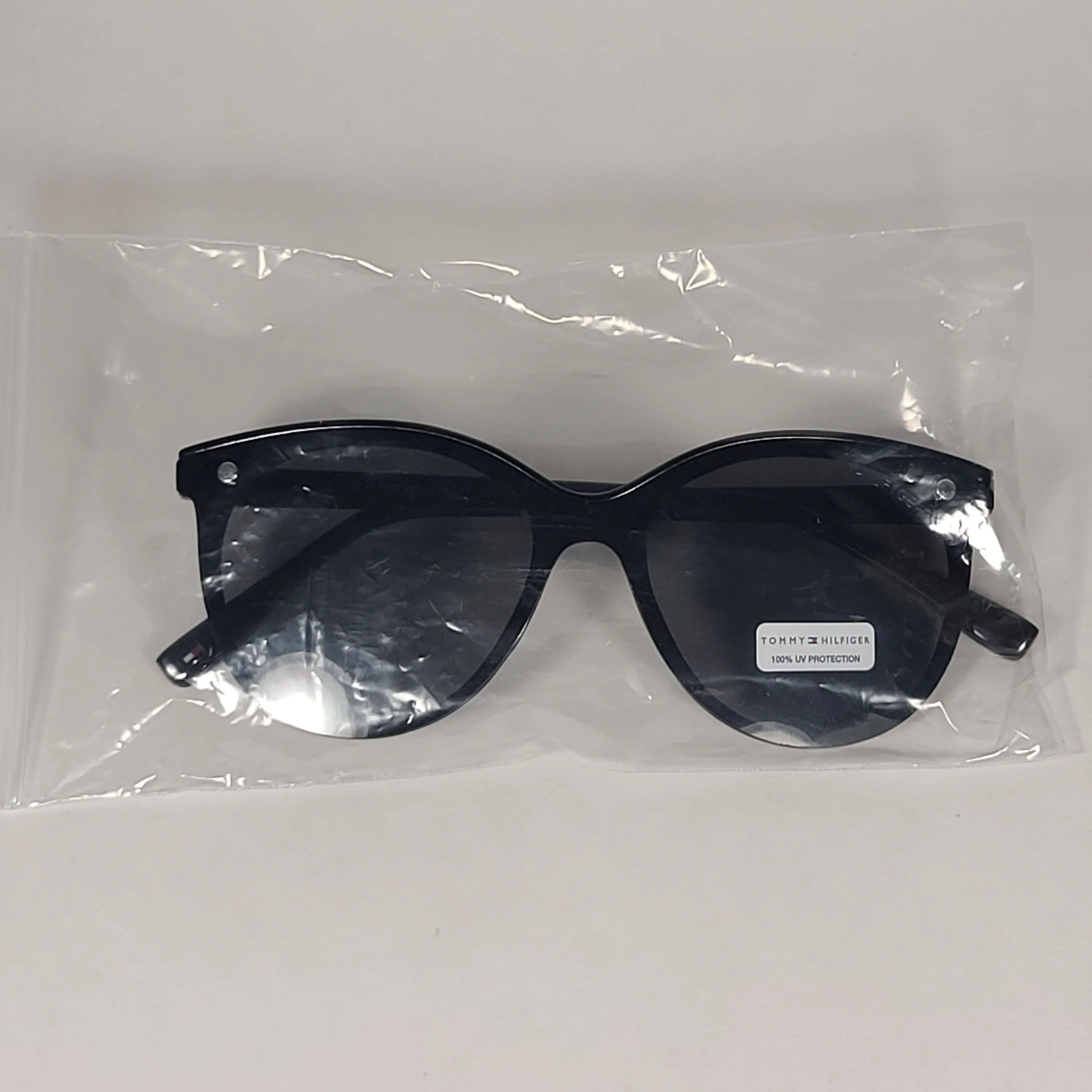 Tommy Hilfiger Reese Rimless Round Sunglasses Shiny Black Gray Single Lens REESE WP OL530